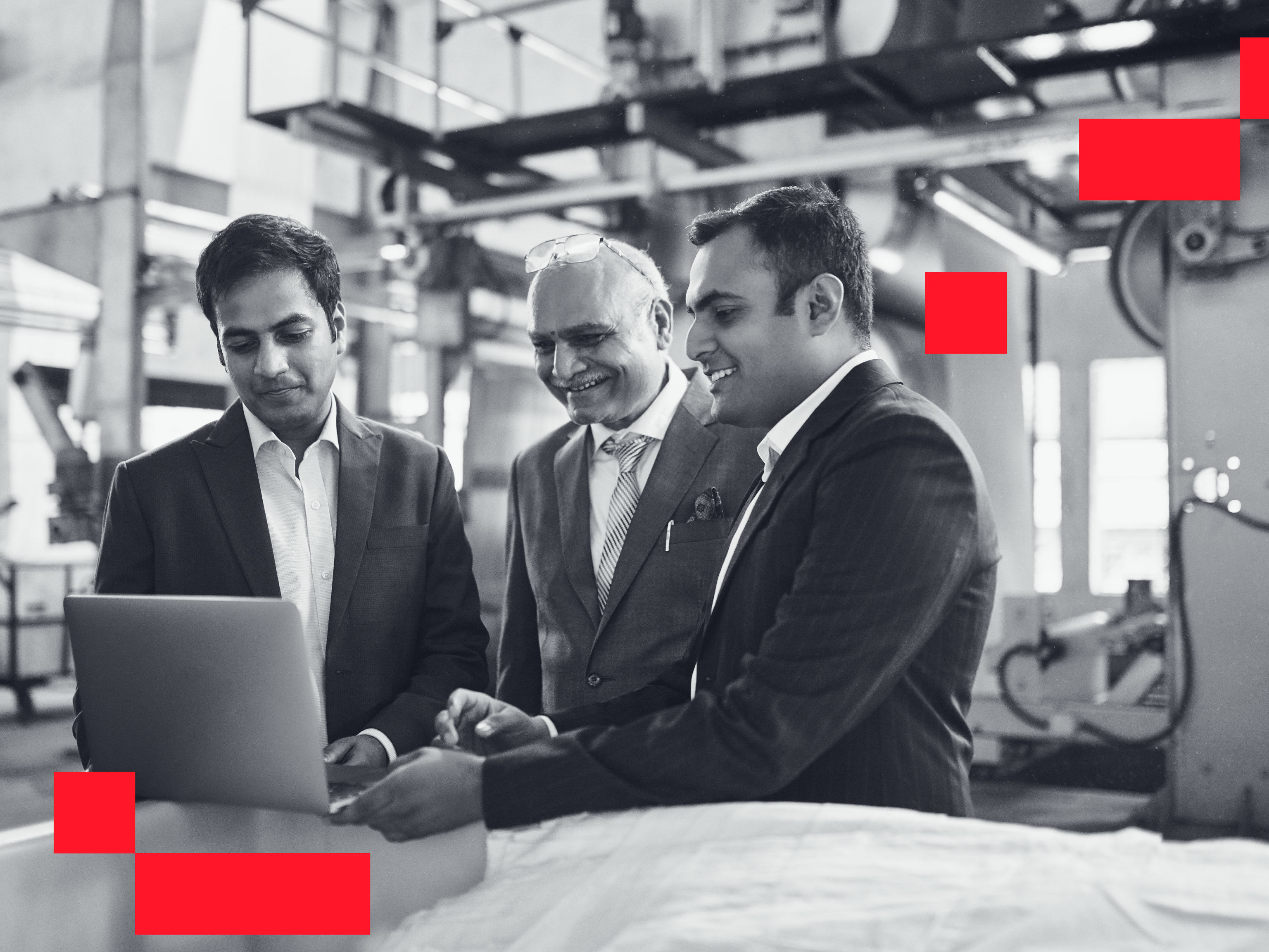 Employees with their Employer discussing business strategies.