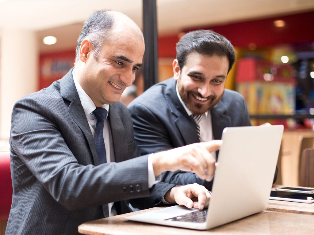 A leader helping his employee.