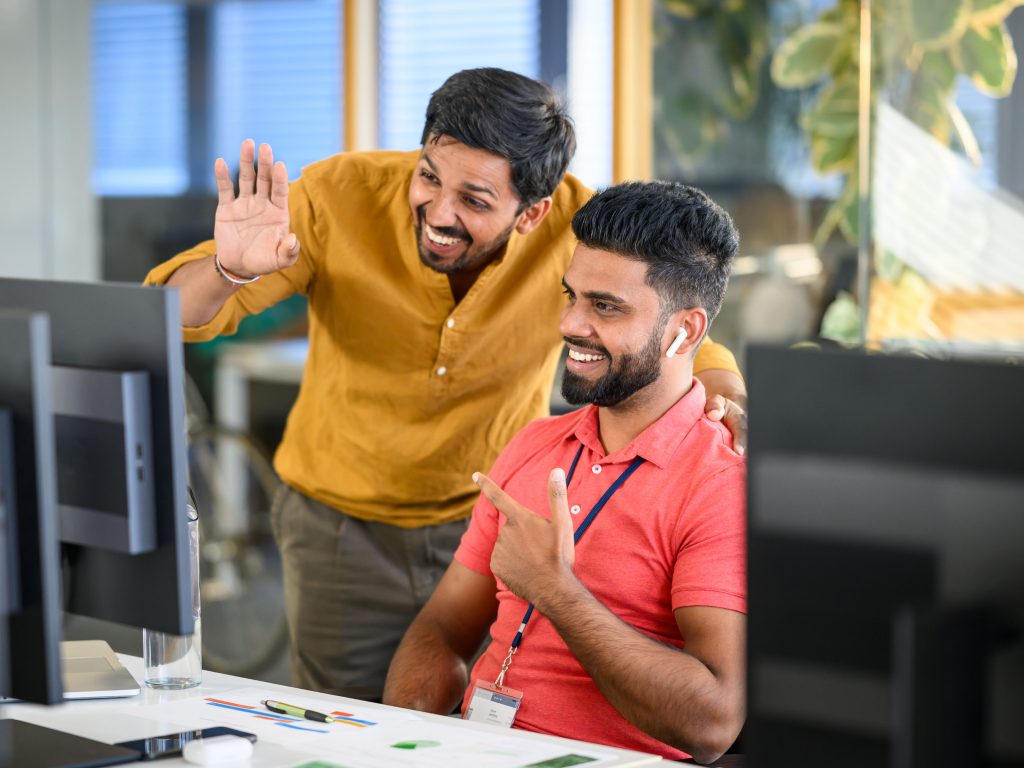 Professionals Greeting Through Conference Call